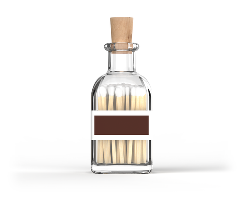 Coloured matches in a stylish glass bottle with strike area on the back from Eldstickan for a great interior design idea