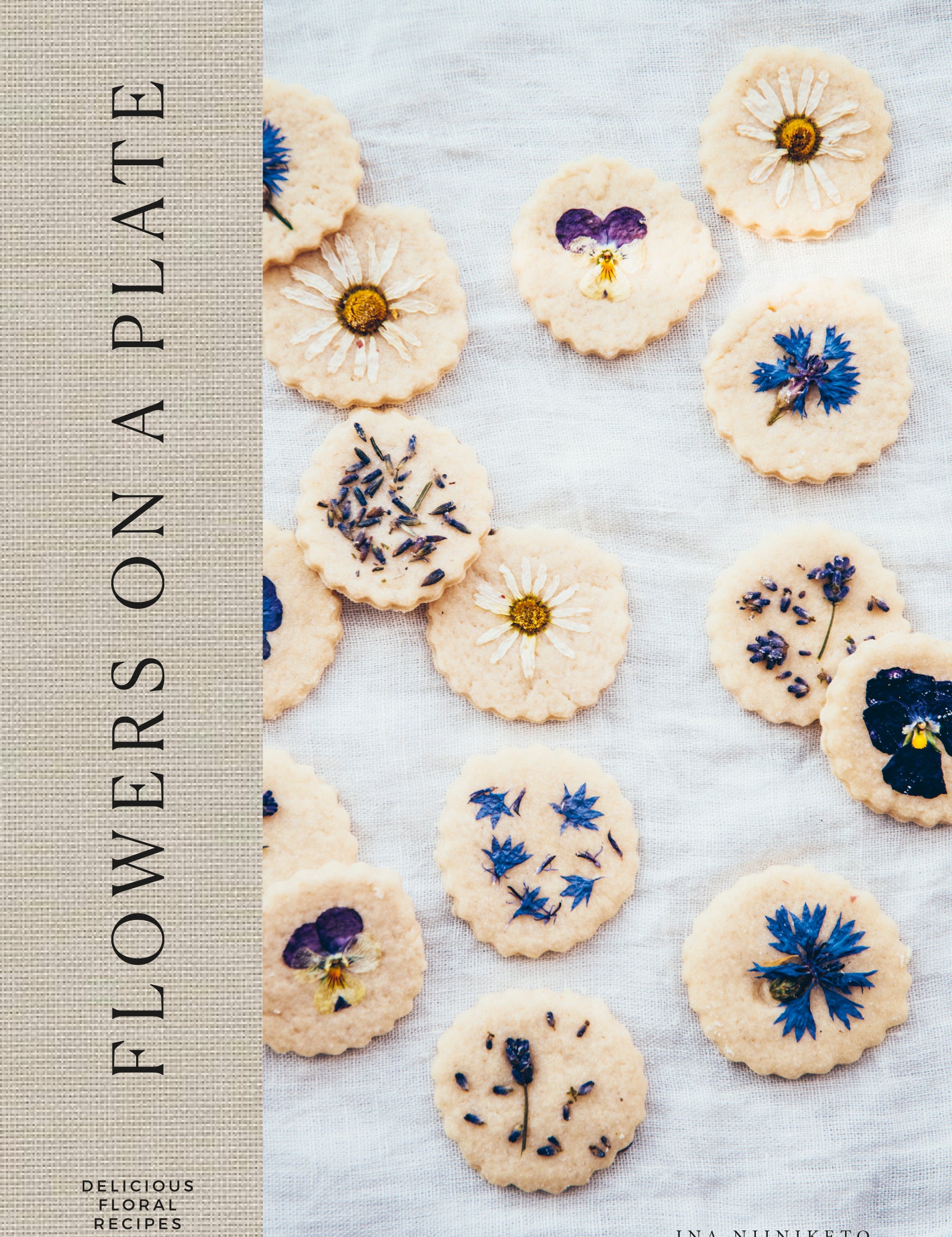 Hardcover book Flowers on a Plate combining floral baking & nature  with beautiful photography of Finnish life, by Cozy Publishing.