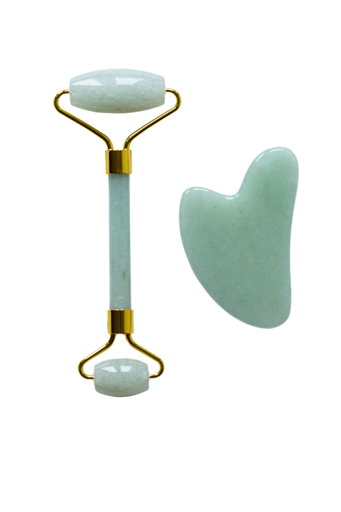 Grums jade gua sha and roller in a gift box for a lovely beauty gift item to create a home ritual that benefits skin tone and drainage.