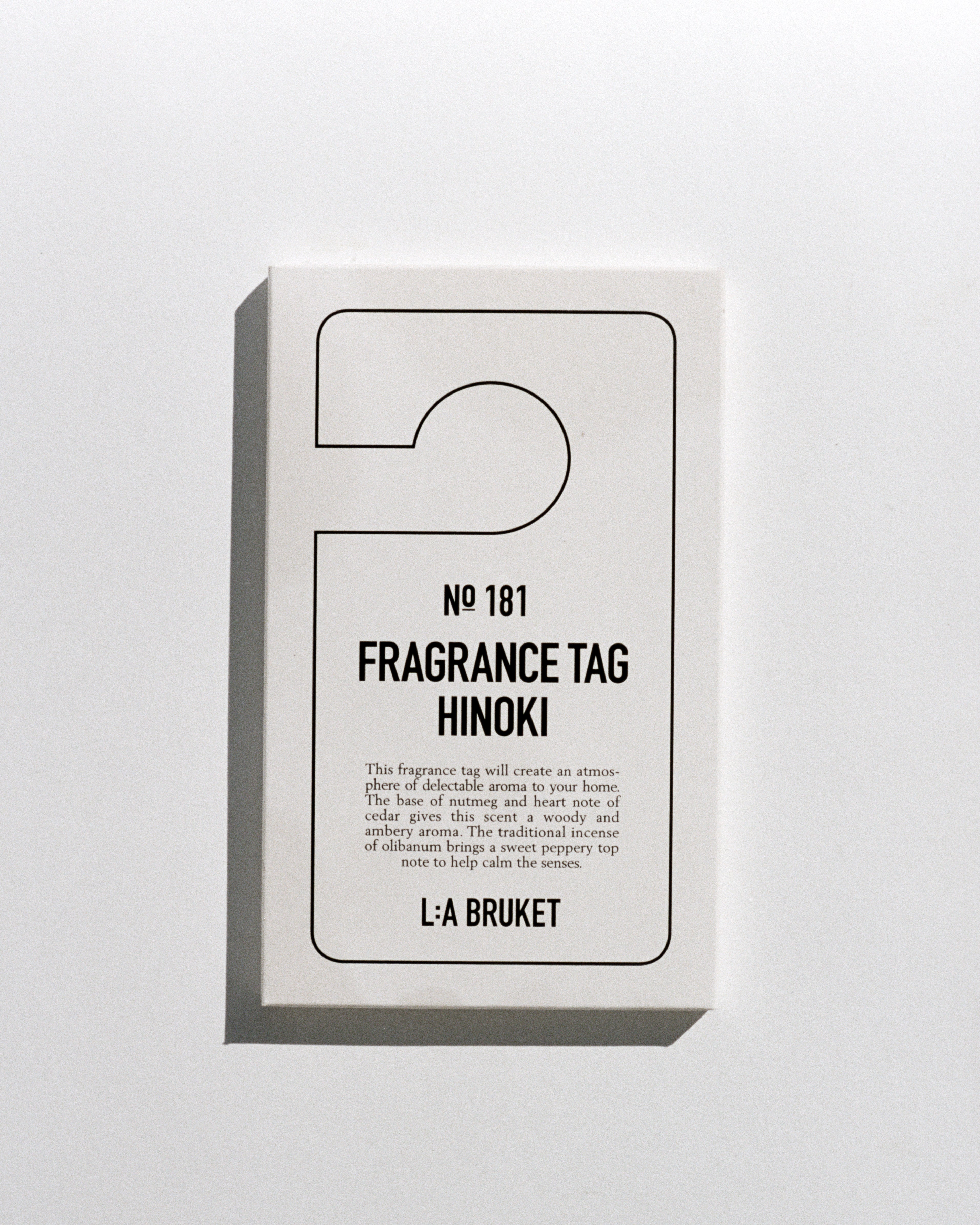 All natural, organic and vegan room scent on hanging tag with the cypress scent of Hinoki from the best of Sweden's coastal home fragrance brand, L:A Bruket