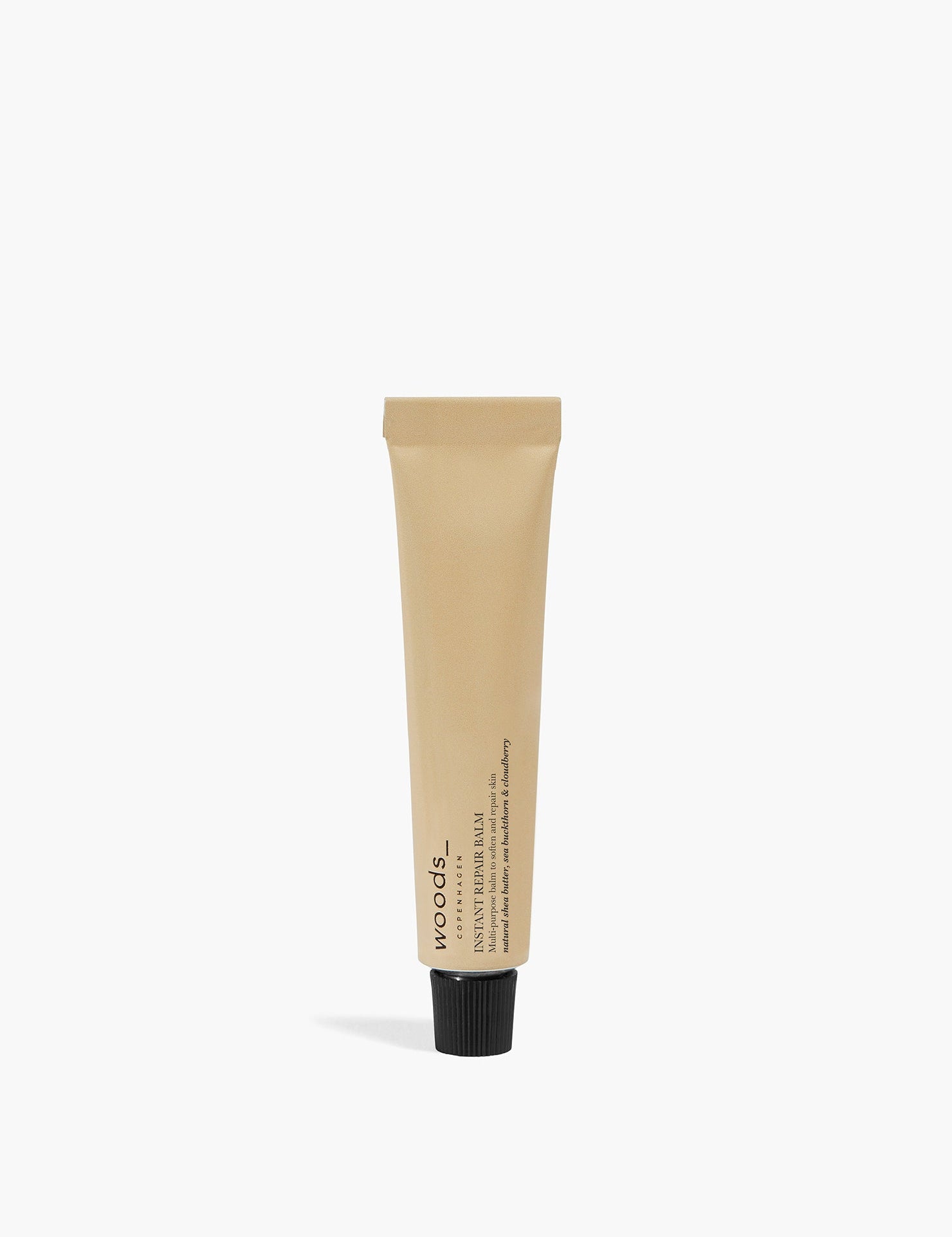 Beige metal mini tube with all natural, organic vegan Instant Repair Balm to repair all irritated skin, unisex , made by Woods Copenhagen. (8511195971889)