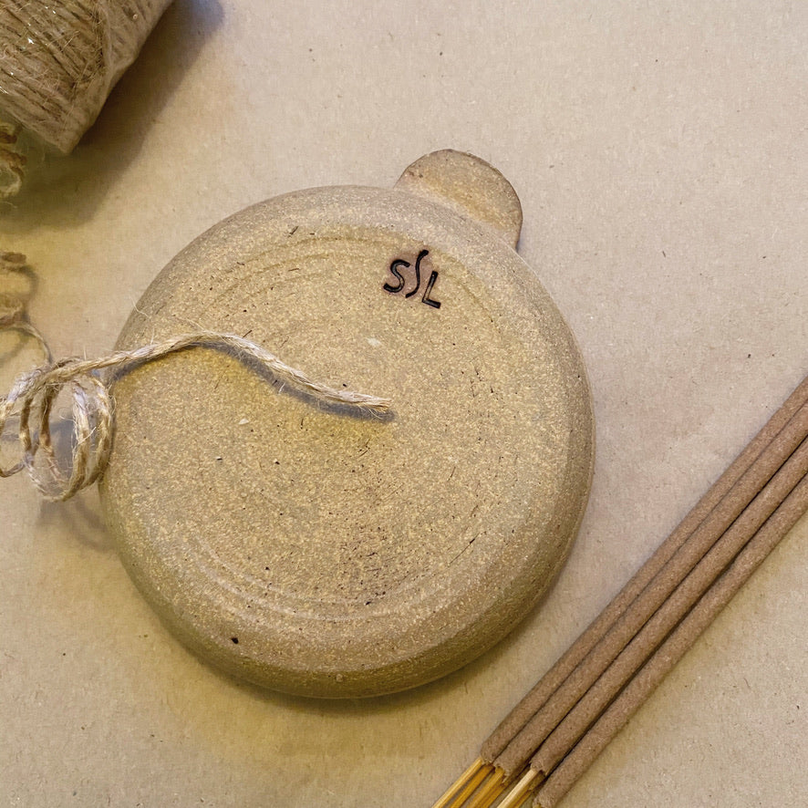 Natural and locally made ceramic incense holders and tea light holders in local Swedish clay.