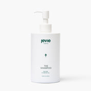 Cleanse and hydrate hair with Jevie Shampoo – clean, Nordic haircare in white pump bottle.