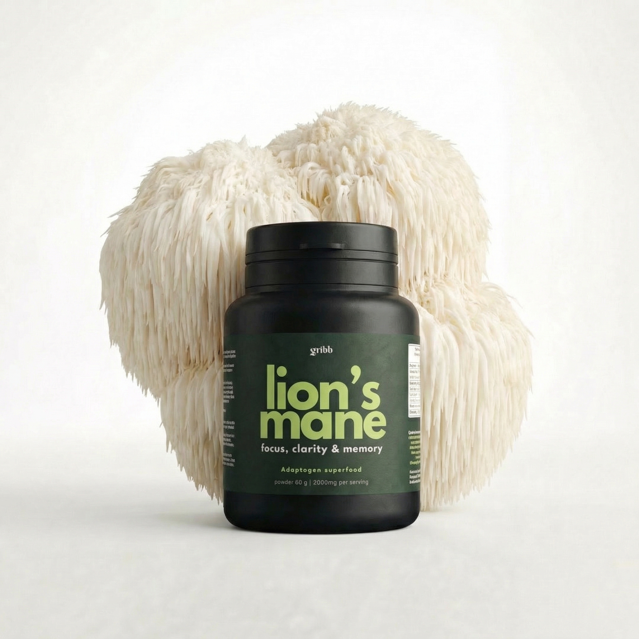 Dark green tub of Lion's Mane supplement with a large white lions mane mushroom behind