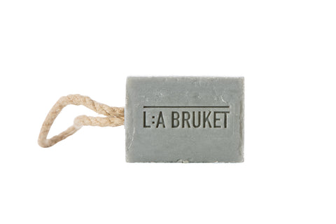 Natural, vegan & organic bar of foot soap with pumice stone, on a sisal rope,  from the nature of Sweden's West Coast by the best selling minimalist L:A Bruket