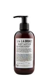 Natural, vegan & organic body lotion in brown pump bottle from the nature of Sweden's West Coast by the best selling minimalist L:A Bruket