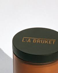All natural, organic and vegan candle in amber glass with the cypress scent of Hinoki from the best of Sweden's coastal home fragrance brand, L:A Bruket