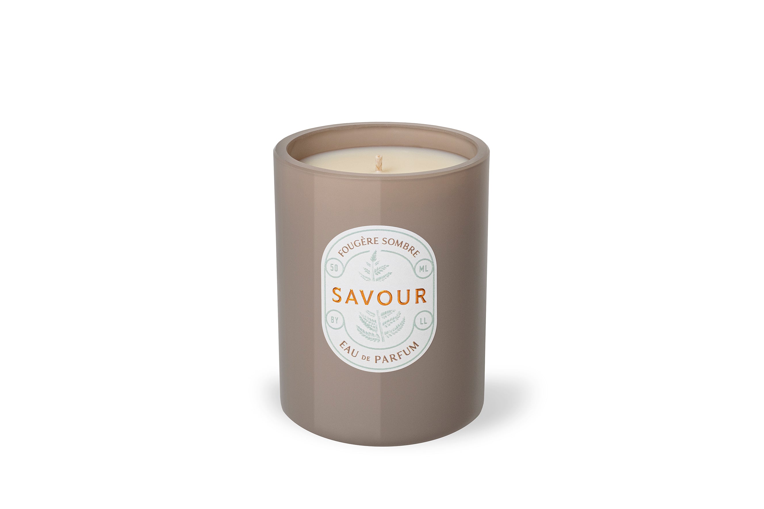 Woody fern scented candle in luxury beige glass. Green notes of lavender, amber & herbs. Organic and vegan. Savour Sweden