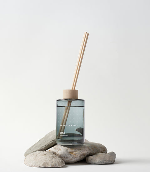 ØY scent diffuser of organic vegan room fragrance with 8 sticks in soft blue coloured glass jars for the best in Nordic home style from Skandinavisk