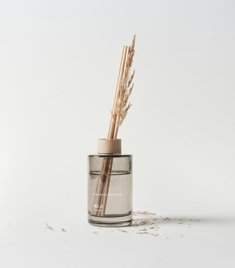 RO scent diffuser of organic vegan room fragrance with 8 sticks in soft coloured glass jars for the best in Nordic home style from Skandinavisk