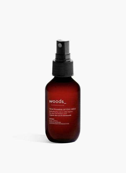 Refresh, hydrate and give an antioxidant boost to the skin with natural, organic vegan Niacinamide Lifting Mist  in its brown pump bottle, ideal for all skins, unisex , made by Woods Copenhagen (8511007981873)