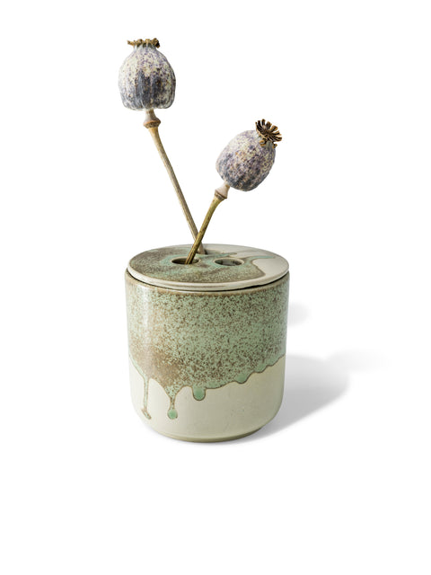 refill or reuse the ceramic vessel once the candle is over, in unique green & sand textured finish from Quod Stockholm with distinctive 3 hole ceramic lid designed for flowers, twigs and natural arrangements.
