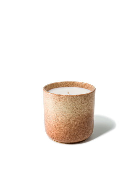 Elegant design and natural sophisticated scent of amber & rose in this refillable ceramic candle in unique rust & natural textured finish from Quod Stockholm, perfect for any home