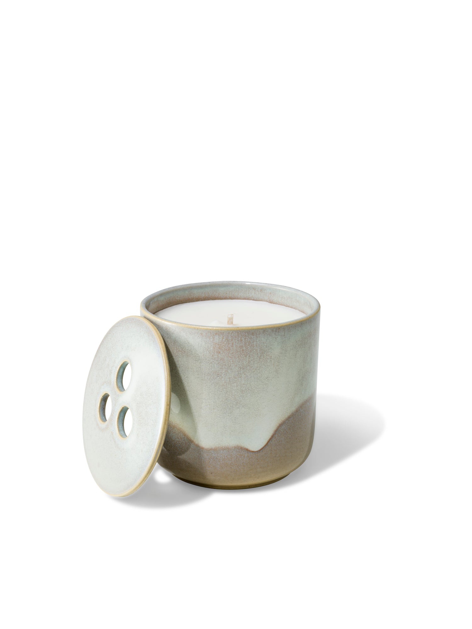 Elegant design and natural sophisticated scent of banira wood in this refillable ceramic candle in unique white &amp; beige textured finish from Quod Stockholm, perfect for any home