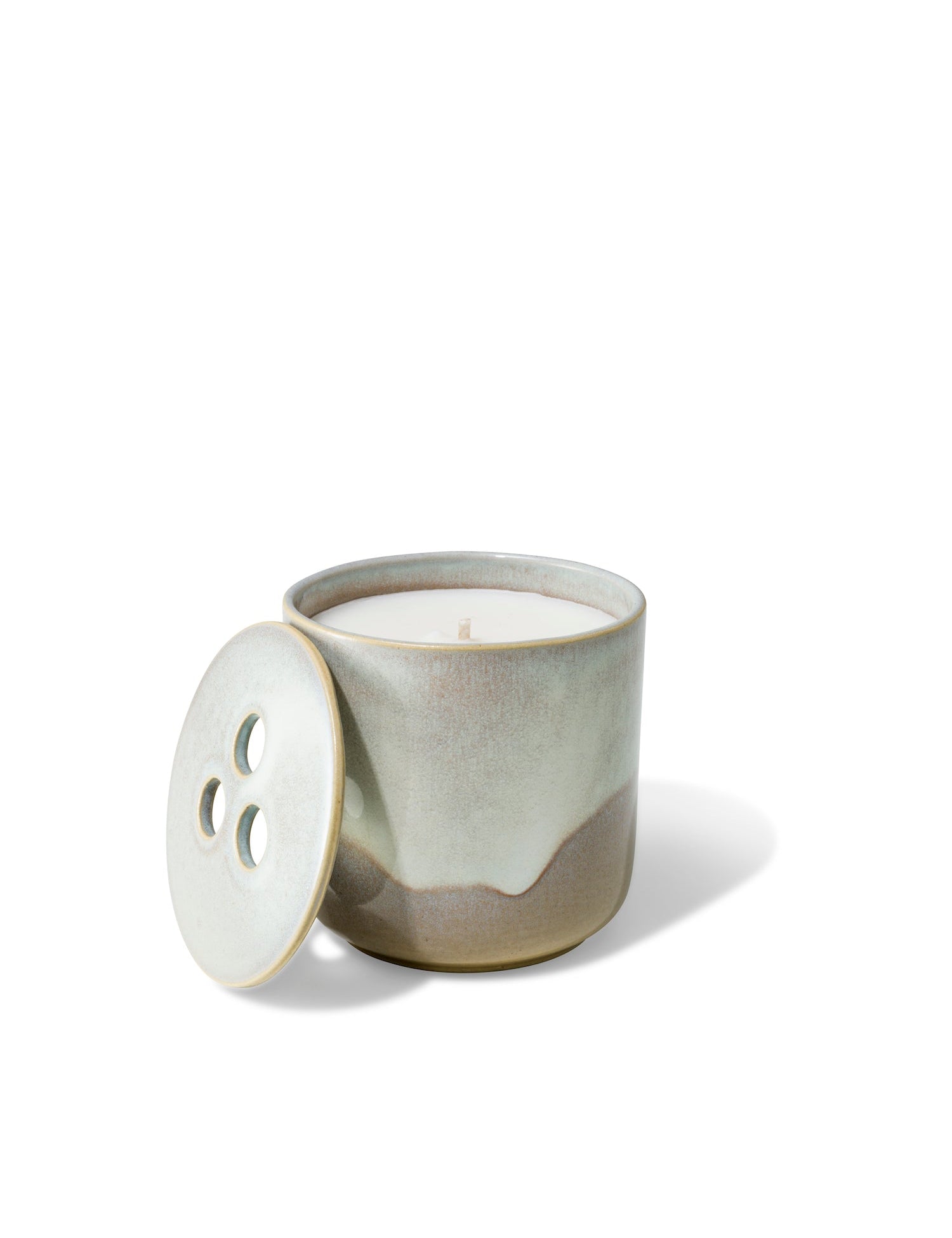 Elegant design and natural sophisticated scent of banira wood in this refillable ceramic candle in unique white & beige textured finish from Quod Stockholm, perfect for any home