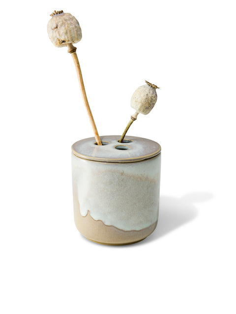 refill or reuse the ceramic vessel once the candle is over, in unique white & natural textured finish from Quod Stockholm with distinctive 3 hole ceramic lid designed for flowers, twigs and natural arrangements.