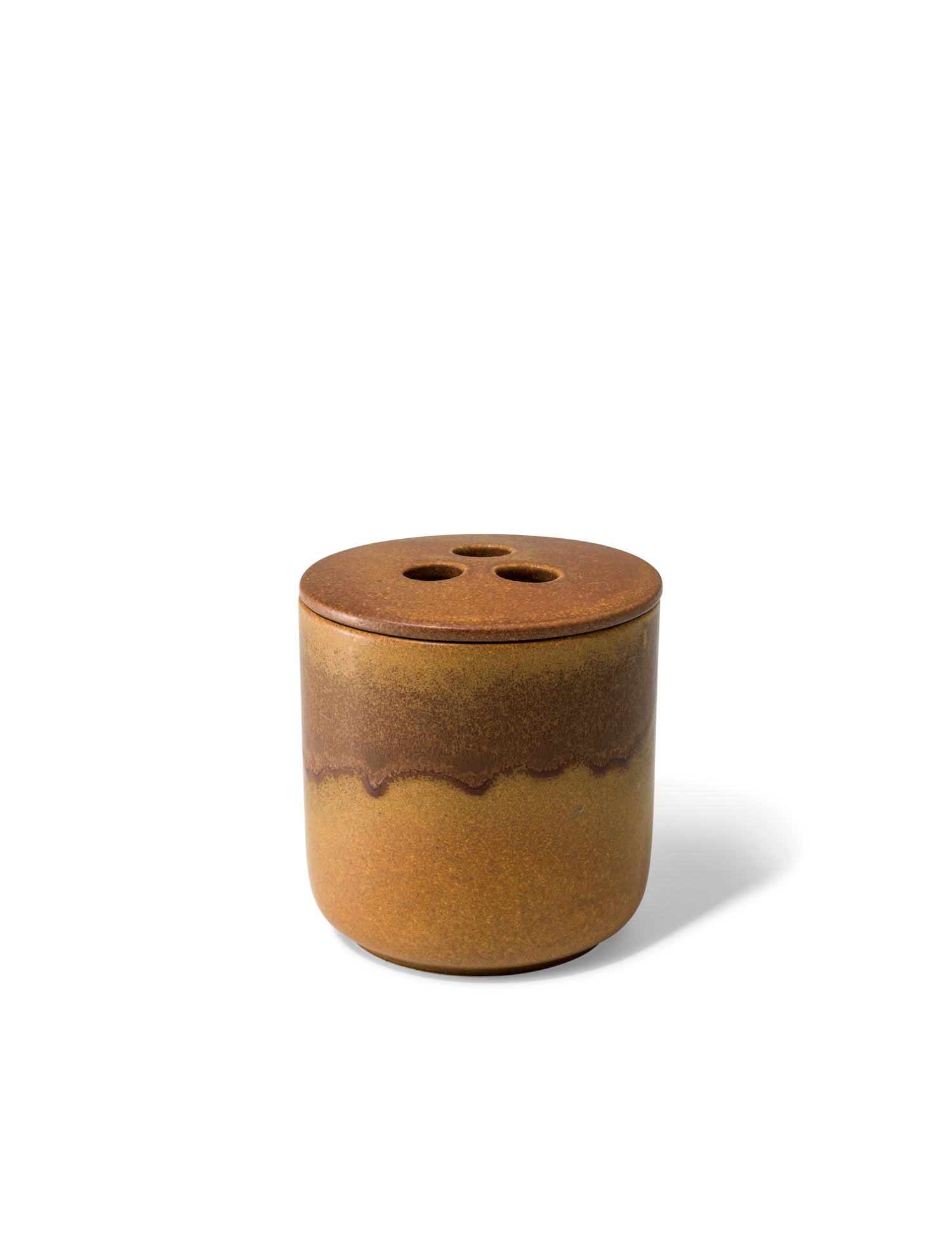 Elegant design and natural sophisticated scent of Forest Fable with its woody citrus notes, in this refillable ceramic candle in unique earthy brown textured finish from Quod Stockholm, perfect for any home