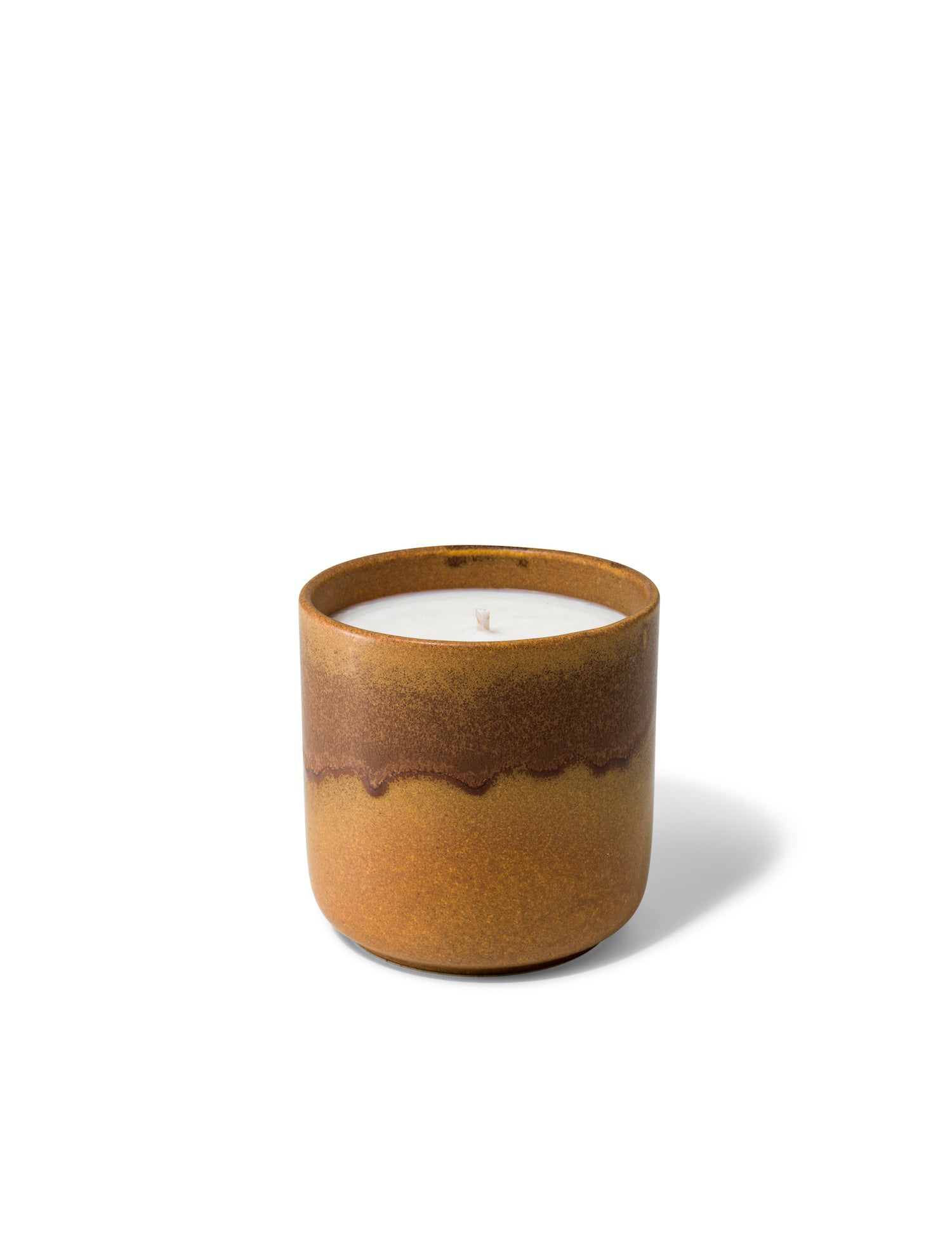 Elegant design and natural sophisticated scent of Forest Fable with its woody citrus notes, in this refillable ceramic candle in unique earthy brown textured finish from Quod Stockholm, perfect for any home