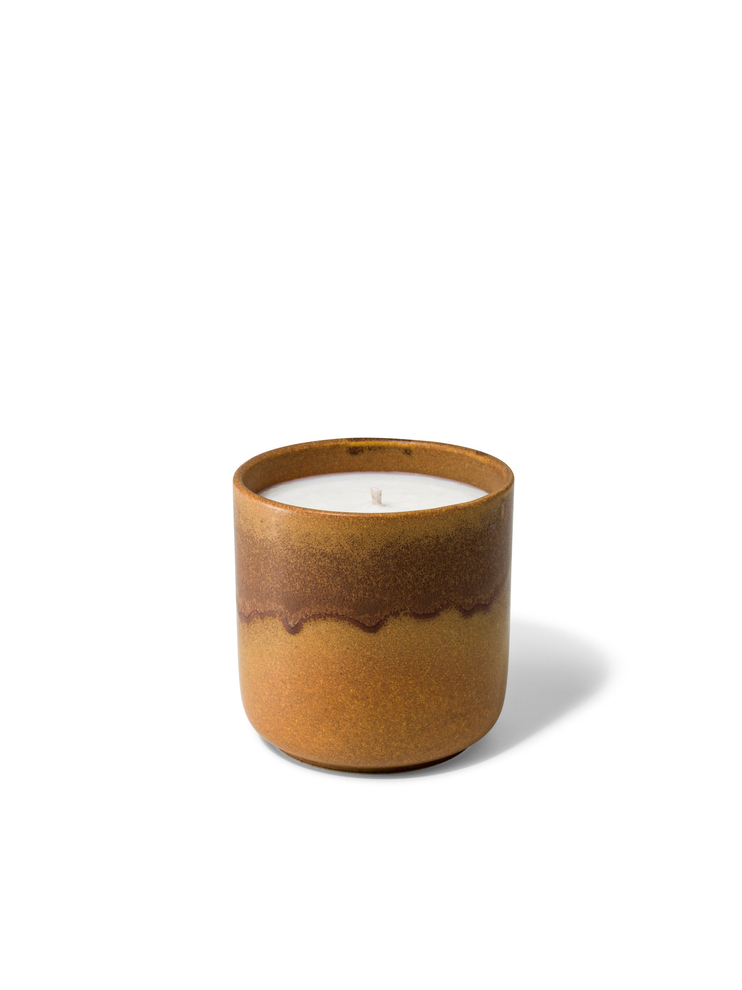 Elegant design and natural sophisticated scent of Forest Fable with its woody citrus notes, in this refillable ceramic candle in unique earthy brown textured finish from Quod Stockholm, perfect for any home