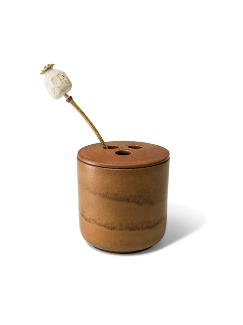 Reuse or refill the ceramic candle jar in unique earthy brown textured finish from Quod Stockholm, with distinctive 3 holed lid ideal for flowers, twigs and natural arrangements