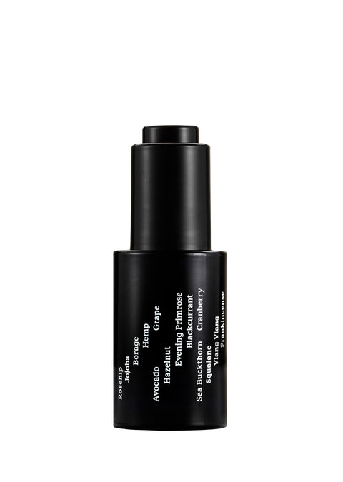 Sleek black glass bottle with stark white text creates a stylish minimalist skincare line from OM-SE. This balancing facial oil is vegan and totally organic for easy beauty routines, ideal for acne skin problems.