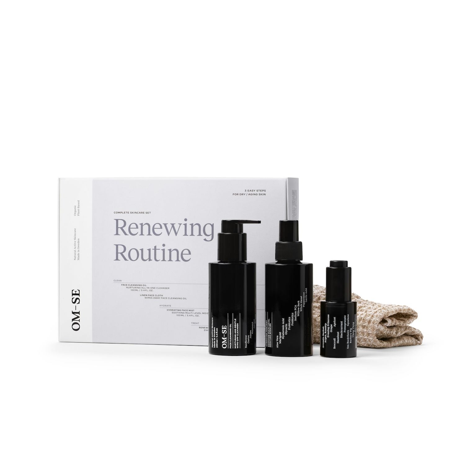 Sleek black glass bottles with stark white text creates a stylish minimalist skincare line from OM-SE. The Renewing Routine has all 4 products needed for easy beauty routines, ideal for dry &amp; older skin types.