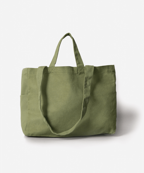 useful tote bag in organic cotton with both long & short handles and a wide shape with additional pockets. Great for yoga mats, beach towels and shopping, from Swedish brand OMOM
