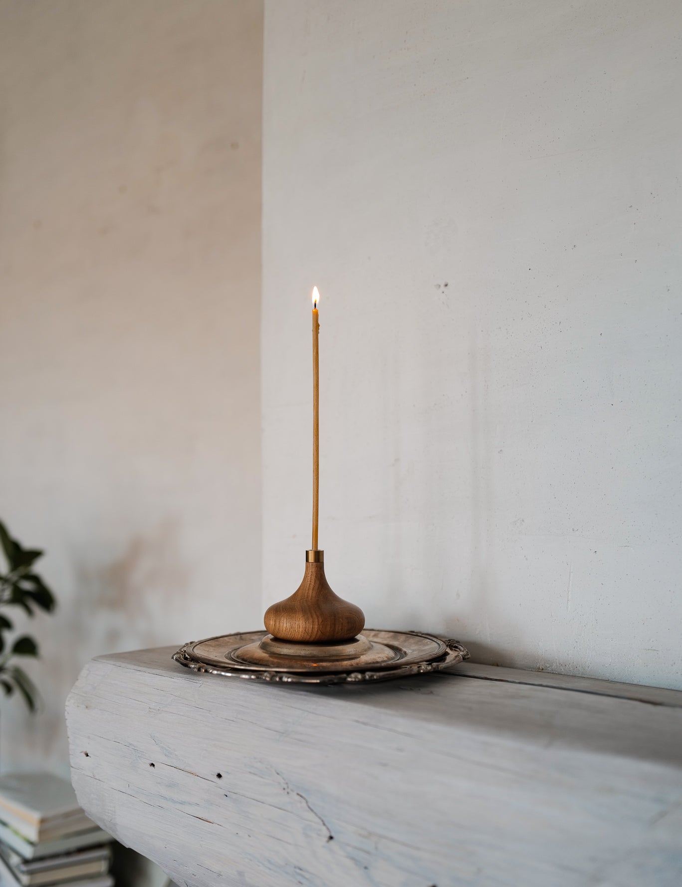 oak and brass candlestick for long thin candles  from Ovo Things