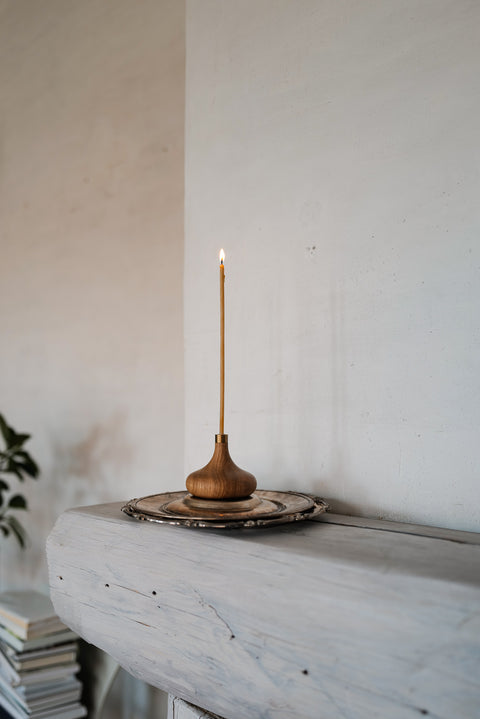 oak and brass candlestick for long thin candles  from Ovo Things