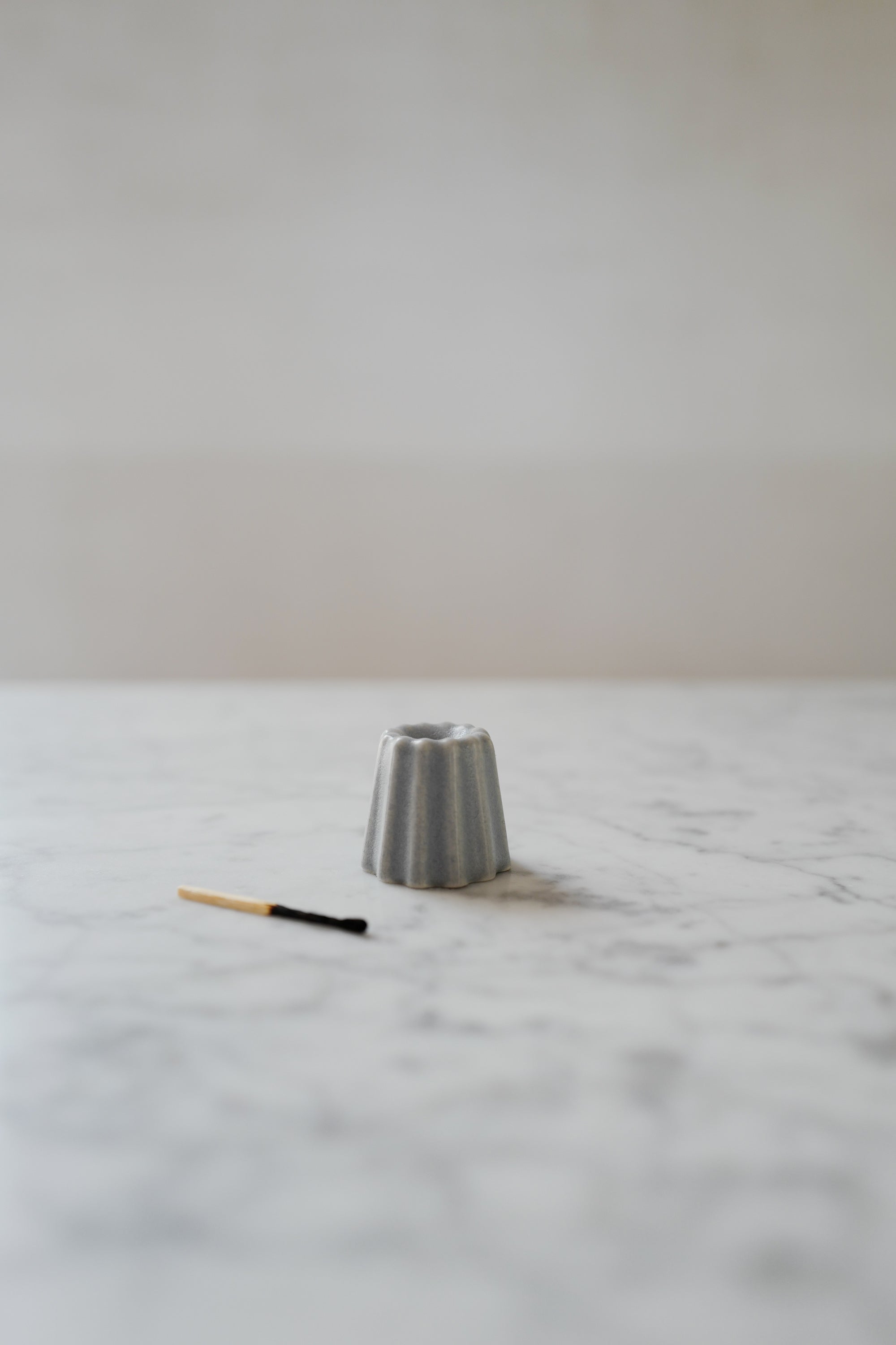 Simple and elegant, stylish grey ceramic candle holders for thin beeswax taper candles by Ovo Things