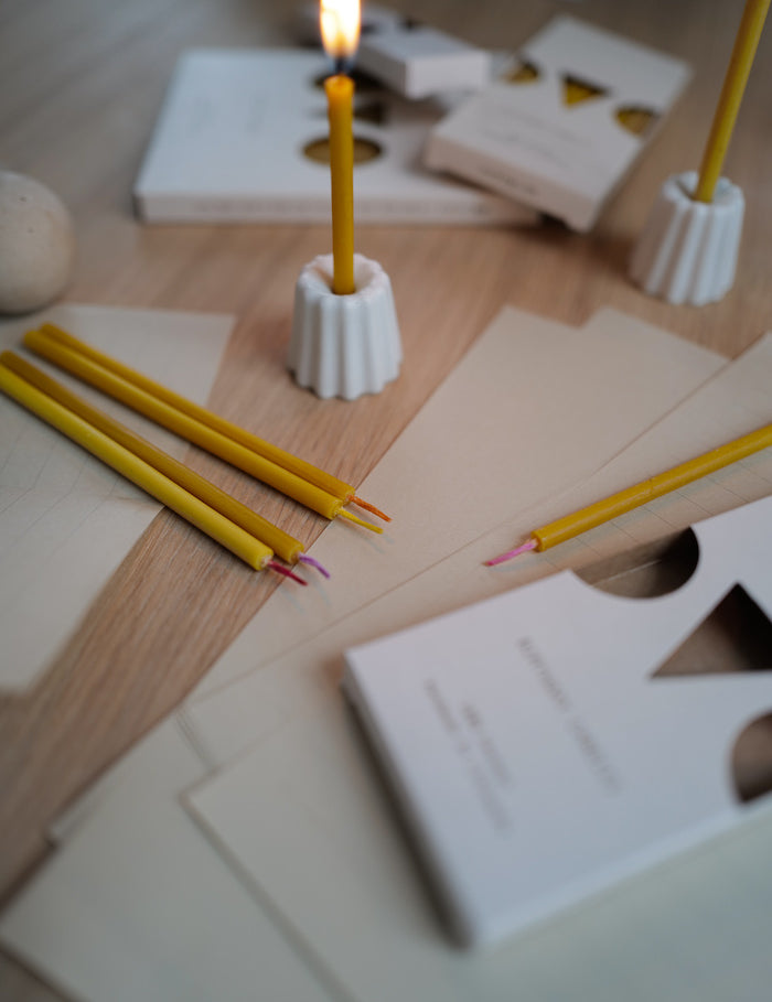 Simple and elegant, stylish hand poured short thin beeswax taper candles with coloured wicks from Ovo Things