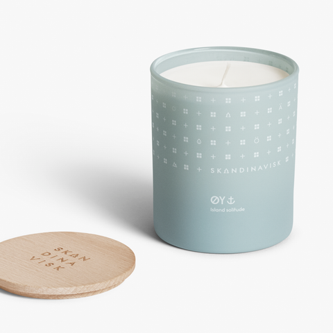 ØY Organic vegan scented candle in soft pale blue toned glass jar for Nordic home style from Skandinavisk