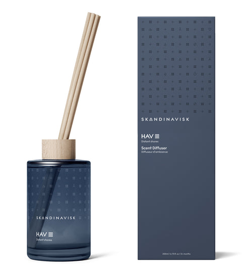 HAV sea breeze scent diffuser of organic vegan room fragrance with 8 sticks in navy blue coloured glass jars for the best in Nordic home style from Skandinavisk