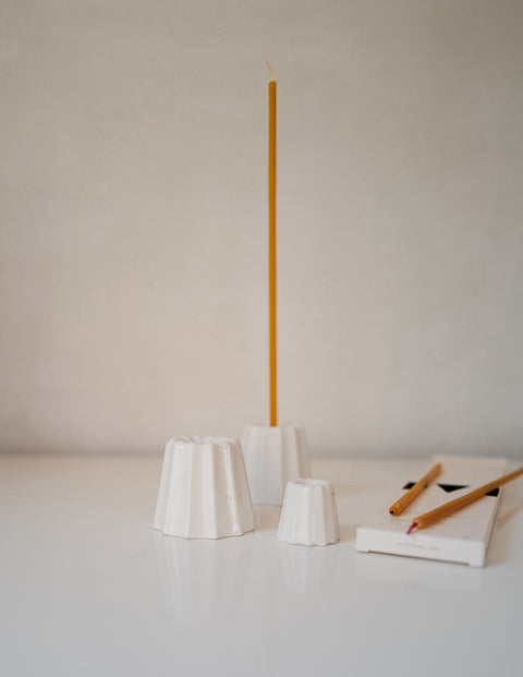 Ceramic hand cast candle holder in white glaze for long thin candles from Ovo Things