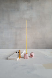 Simple and elegant, stylish pink ceramic candle holders for long thin beeswax taper candles from Ovo Things