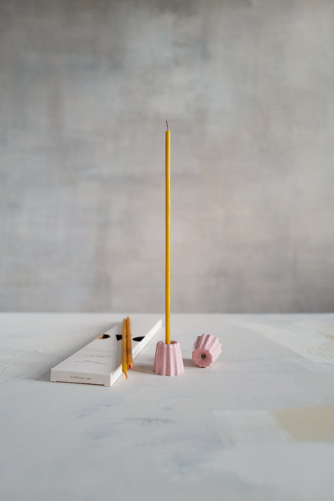 Simple and elegant, stylish pink ceramic candle holders for long thin beeswax taper candles from Ovo Things