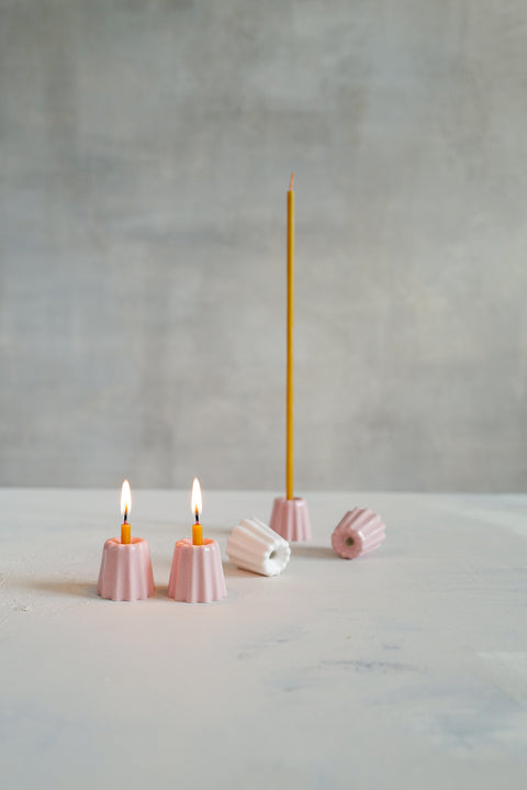 Simple and elegant, stylish ceramic candle holders for long thin beeswax taper candles from Ovo Things
