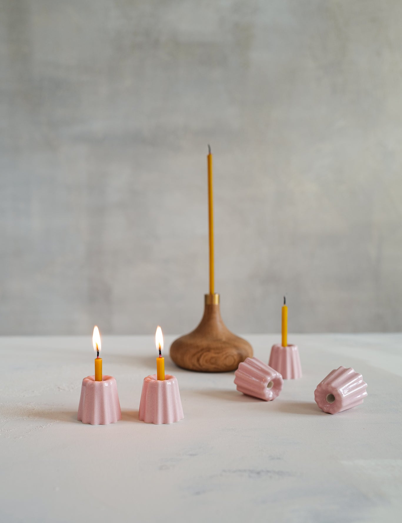 Pink ceramic and natural oak candle holders for thin beeswax taper candles from Ovo Things