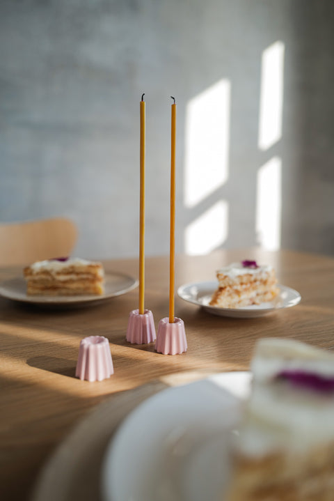 Simple and elegant, stylish pink ceramic candle holders for long thin beeswax taper candles from Ovo Things
