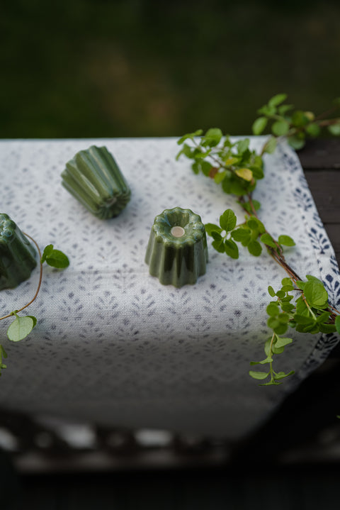 Simple and elegant, stylish green ceramic candle holders for thin beeswax taper candles byOvo Things