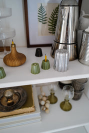 Simple and elegant, stylish green ceramic candle holders for thin beeswax taper candles form Ovo Things