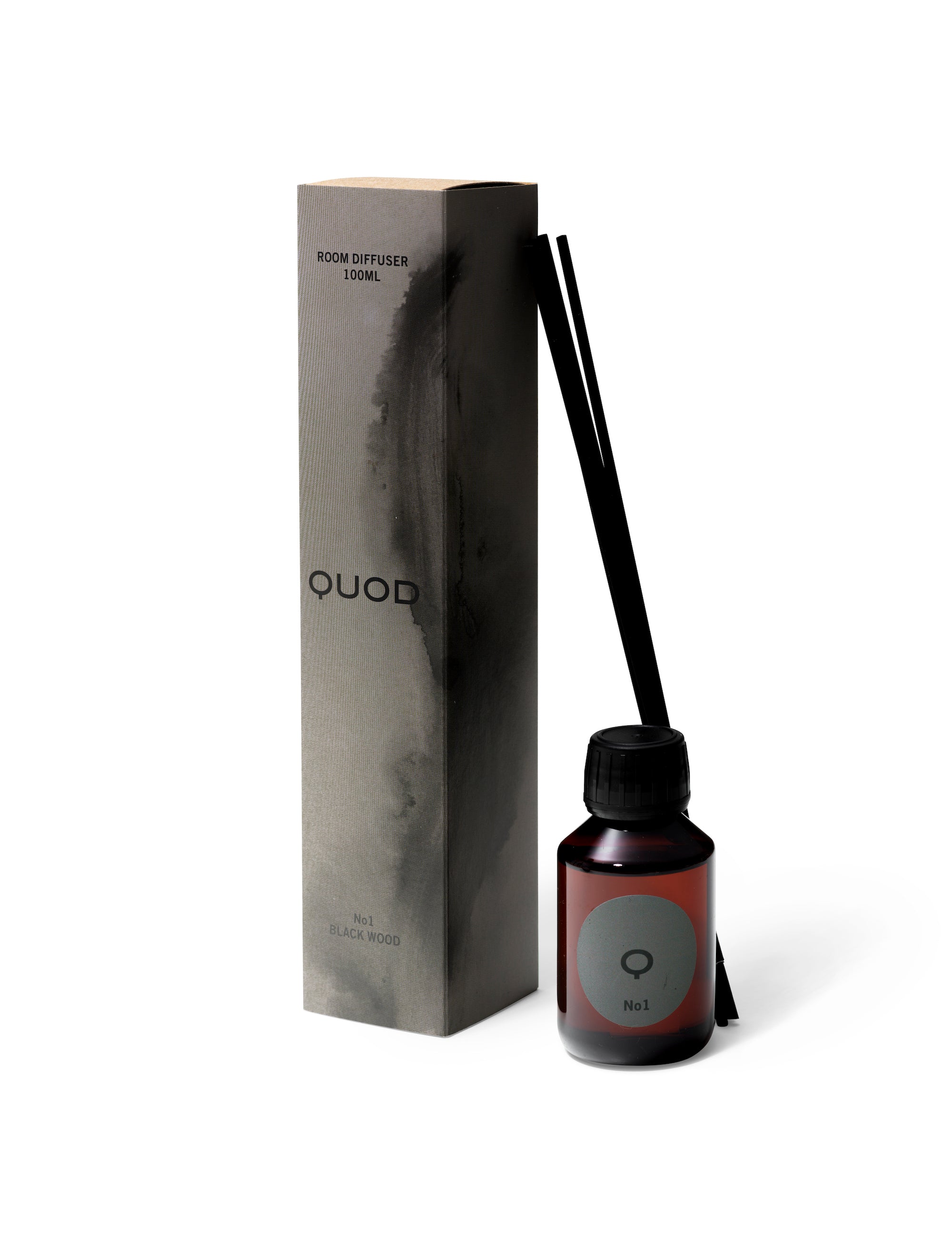 Elegant design and natural sophisticated scent in the smokey grey box, of room diffuser No 1 Black Wood from Quod Stockholm, with distinctive black bottle & sticks