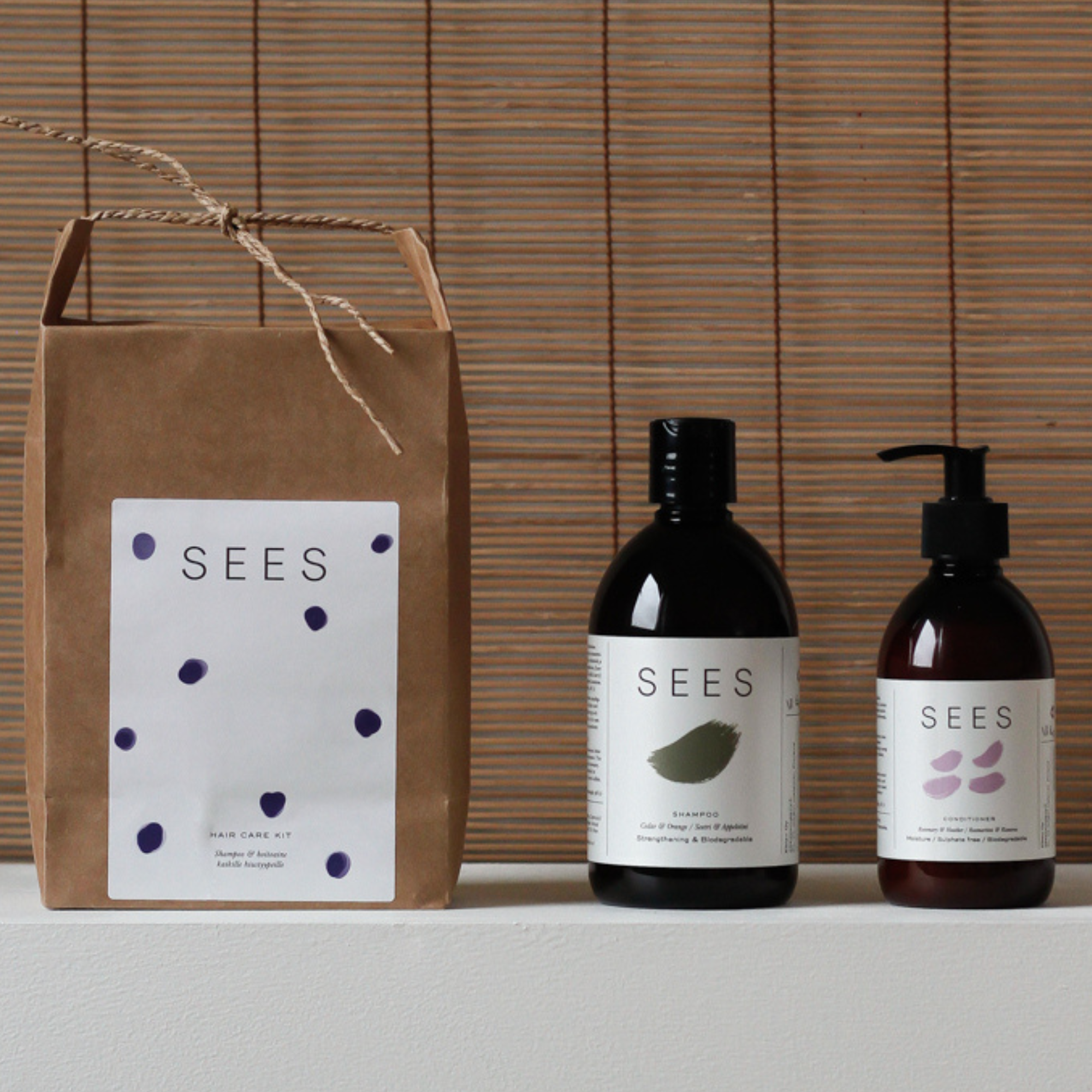 Sustainable and biodegradeable hair shampoo & conditioner in stylish rice bag packaging, for a great gift for the conscious consumer from Finland's natural beauty company SEES