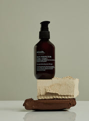 Gentle exfoliation and renewed skin with natural, organic vegan Skin Perfector in its brown pump bottle, ideal for all skins, unisex , made by Woods Copenhagen (8509594730801)