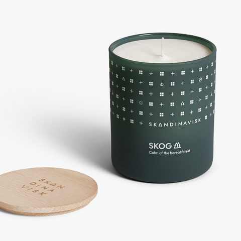 SKOG organic vegan forest scented candle in matt dark green glass jar with wooden lid for Nordic home style from Skandinavisk