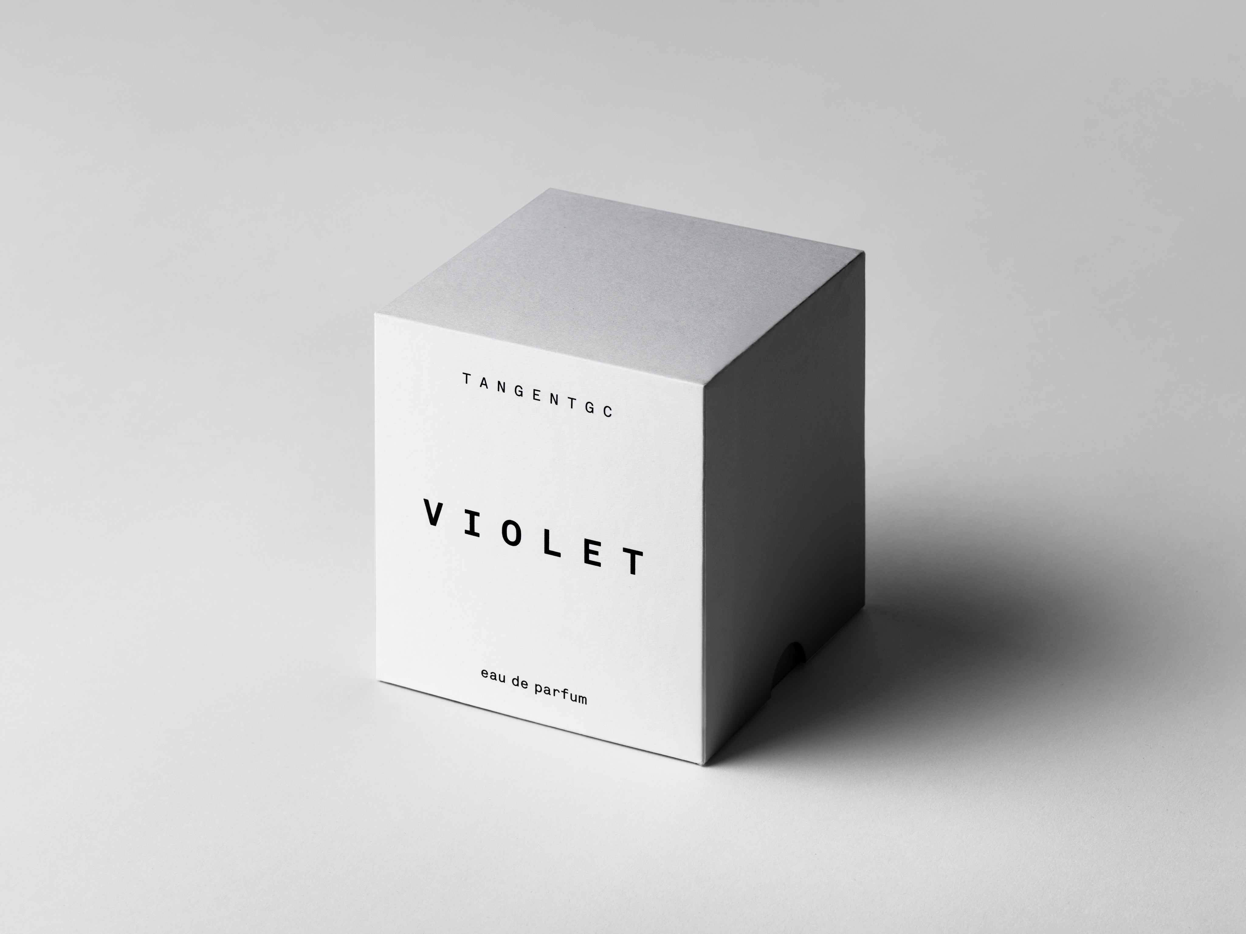 Simple & refined white box with statement text for a clean fragrance with natural scent , Violet is a powdery floral eau de parfum from Tangent GC