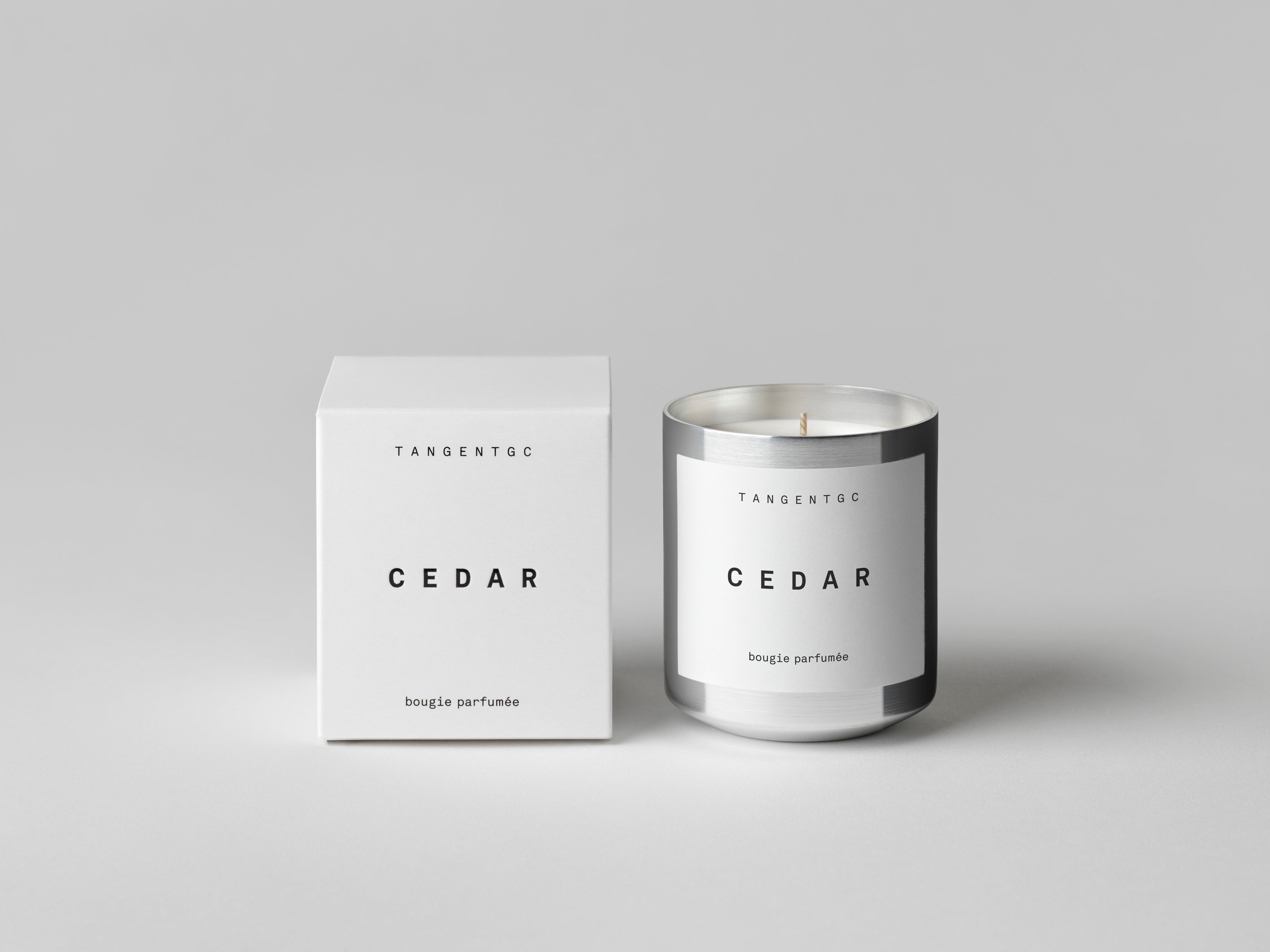 Simple & refined white box with statement text for luxury vegan candle with natural Cedar woody fragrance from Tangent GC