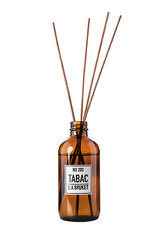 All natural, organic and vegan room diffuser in amber glass with the green & sweet scent of Tabac from the best of Sweden's coastal home fragrance brand, L:A Bruket