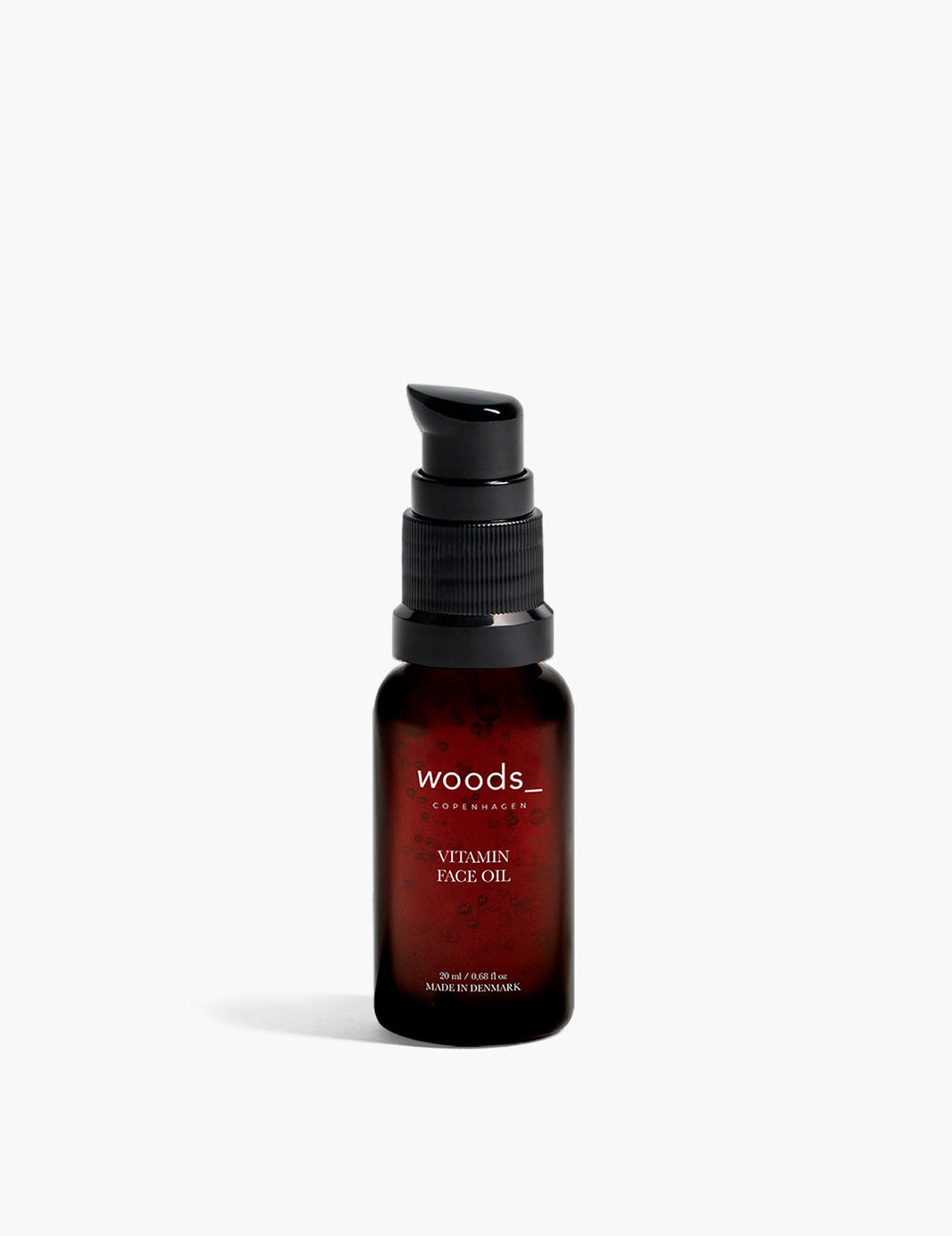 a multi vitamin and antioxidant boost to the skin with natural, organic vegan Vitamin face Oil in its brown pump bottle, ideal for all skins, unisex , made by Woods Copenhagen (8510956306737)