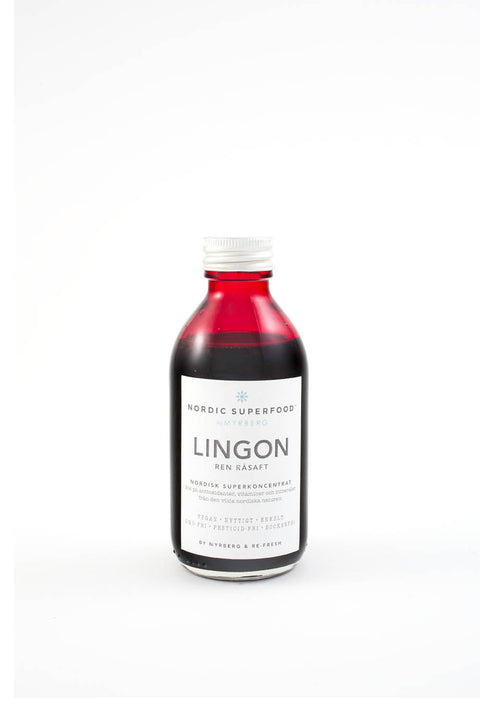 Glass bottle of pure, concentrated raw pressed lingonberry  health shot from Nordic Superfoods.